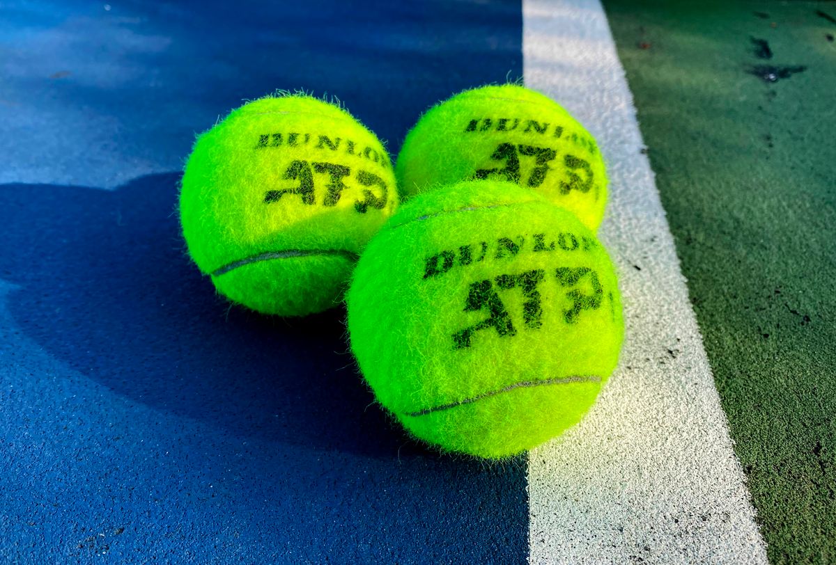 Tennis balls on court