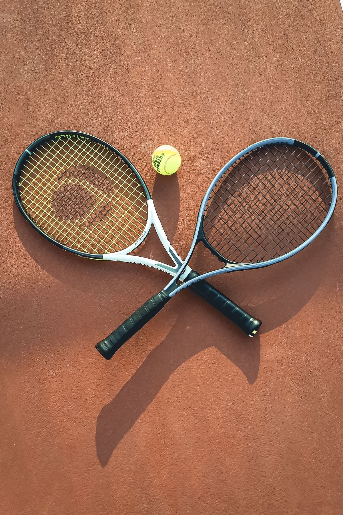 Tennis rackets on court