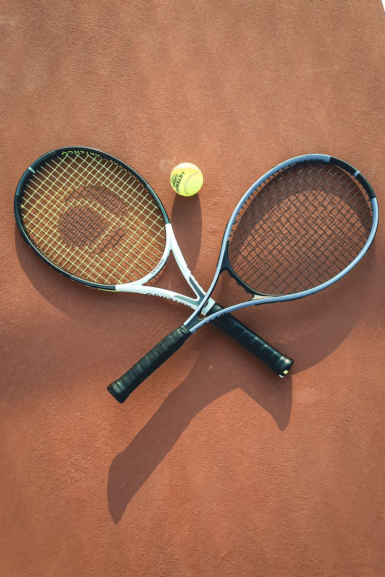 Tennis rackets on court